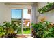 Cozy balcony with artificial grass and outdoor seating, perfect for relaxing with plants at 865 S Quebec St # 302A, Denver, CO 80247