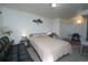 Relaxing bedroom with seating and natural light at 865 S Quebec St # 302A, Denver, CO 80247