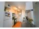 Efficient kitchen featuring white cabinets, black appliances, and a stainless steel sink at 865 S Quebec St # 302A, Denver, CO 80247
