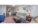 Comfortable living room with hardwood floors, and easy access to the kitchen and dining area at 865 S Quebec St # 302A, Denver, CO 80247