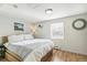Cozy bedroom with natural light, hardwood floors, and simple decor at 1970 Willow St, Denver, CO 80220