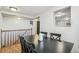 Light filled dining room with view into kitchen and staircase at 1970 Willow St, Denver, CO 80220