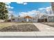 Attractive single-story home with a covered porch and well-maintained yard at 1970 Willow St, Denver, CO 80220