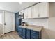 Updated kitchen with granite countertops, stainless appliances, and a tile backsplash at 1970 Willow St, Denver, CO 80220