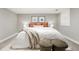 Serene bedroom featuring a cozy bed, soft pillows, and warm lighting for a restful ambiance at 635 Fillmore St, Denver, CO 80206