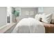 Bright bedroom with a comfortable bed, ample natural light, and simple decor creating a peaceful retreat at 635 Fillmore St, Denver, CO 80206