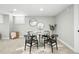 Cozy dining area with a round table, stylish chairs, and minimalist decor creating an inviting space for meals at 635 Fillmore St, Denver, CO 80206