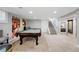 Recreational room featuring a pool table and stylish decor, perfect for entertaining guests and relaxing at 635 Fillmore St, Denver, CO 80206