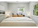 Cozy bedroom featuring a well-decorated bed with comfortable pillows and plenty of natural light at 635 Fillmore St, Denver, CO 80206
