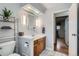 Bright bathroom with a functional vanity, decorative fixtures, and a clean, neutral color palette at 7005 S Ash Cir, Centennial, CO 80122