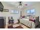 Bedroom with daybed, ceiling fan and hardwood floor at 7005 S Ash Cir, Centennial, CO 80122