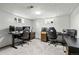 Finished basement area with two desks, office chairs and carpet at 31 W Fremont Ave, Littleton, CO 80120