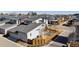 Aerial view of home showcasing fenced backyard, patio area, and modern design at 65 Newport St, Denver, CO 80230