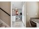 Hallway view to living room and desk nook with granite countertop at 65 Newport St, Denver, CO 80230