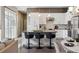 Modern kitchen with white cabinets, granite counters, and stainless steel appliances at 65 Newport St, Denver, CO 80230