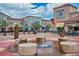 Town center plaza with decorative fountain, outdoor dining, and retail shops at 65 Newport St, Denver, CO 80230