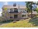 Two-story home with stone accents and a large deck at 12421 High Country Trl, Littleton, CO 80127