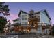 Two-story home with large deck and expansive windows at 12421 High Country Trl, Littleton, CO 80127