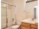 Standard bathroom featuring a shower and bath combination and single vanity at 71 Woodland Cir, Highlands Ranch, CO 80126
