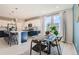 Spacious kitchen with an island and dark blue cabinetry at 15983 E Warner Dr, Denver, CO 80239