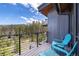 Relaxing balcony with seating and scenic mountain views at 2250 Highlands Dr, Breckenridge, CO 80424