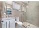 Sleek bathroom featuring a glass shower, minimalist design, and contemporary fixtures for a modern and clean aesthetic at 2250 Highlands Dr, Breckenridge, CO 80424