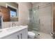 Contemporary bathroom featuring a glass shower, stylish vanity, and a soothing color palette for a spa-like experience at 2250 Highlands Dr, Breckenridge, CO 80424