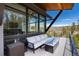 Relaxing deck area with mountain view, outdoor seating and gas fire pit at 2250 Highlands Dr, Breckenridge, CO 80424