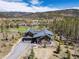 Beautiful modern exterior with a mountain view and professional landscaping at 2250 Highlands Dr, Breckenridge, CO 80424