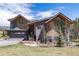 Charming front exterior showcasing modern design and well-manicured lawn at 2250 Highlands Dr, Breckenridge, CO 80424