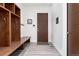 Inviting mud room with bench and door at 2250 Highlands Dr, Breckenridge, CO 80424