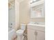 Updated bathroom featuring modern vanity, toilet and shower over tub at 9960 Kline St, Broomfield, CO 80021