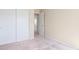 Comfortable bedroom featuring carpet, a closet and a neutral color scheme at 9960 Kline St, Broomfield, CO 80021