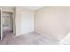 Comfortable bedroom with neutral color scheme, carpet and large closet at 9960 Kline St, Broomfield, CO 80021
