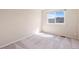 Cozy bedroom with neutral walls, carpeted floors, and bright, natural light at 9960 Kline St, Broomfield, CO 80021
