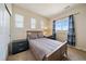 Bedroom with natural light from three windows, a cozy bed and closet at 26530 E Euclid Pl, Aurora, CO 80016