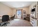 Bright office space features a desk and shelving at 26530 E Euclid Pl, Aurora, CO 80016