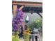 Charming patio with a pergola, comfortable seating, decorative plants, and stylish decor at 26530 E Euclid Pl, Aurora, CO 80016