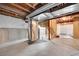 Unfinished basement featuring exposed ceiling, open floor plan, and visible utilities at 13457 Locust St, Thornton, CO 80602