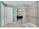 Bathroom with step-in shower with glass door at 13457 Locust St, Thornton, CO 80602