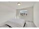 Cozy bedroom with window and neutral tones at 13457 Locust St, Thornton, CO 80602