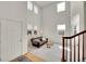 Bright living room with high ceilings and large windows at 13457 Locust St, Thornton, CO 80602