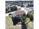 Home boasts a spacious yard enclosed by a wooden fence, offering an ideal setting for outdoor enjoyment and privacy at 10253 Fairgate Way, Highlands Ranch, CO 80126