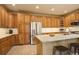 Spacious kitchen with stainless steel appliances, granite counters, and tile floors at 10253 Fairgate Way, Highlands Ranch, CO 80126