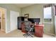 Functional home office with natural light, ample desk space, and storage at 10253 Fairgate Way, Highlands Ranch, CO 80126