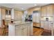 Gourmet kitchen boasting stainless steel appliances and custom cabinetry for ample storage at 9880 E Progress Cir, Greenwood Village, CO 80111