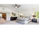 Bright main bedroom with adjoining hall and bath at 9880 E Progress Cir, Greenwood Village, CO 80111