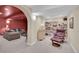 Basement featuring carpeted floors, neutral walls, a sitting area and book shelves at 2032 W Nantucket Ct, Littleton, CO 80120