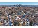 Stunning aerial view of home's location, showcasing its proximity to the city skyline at 3323 W Hayward Pl, Denver, CO 80211