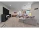 Basement featuring a projector screen, home theatre seating, and shelving at 3323 W Hayward Pl, Denver, CO 80211